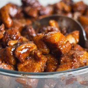 Clear bowl of braised pork belly