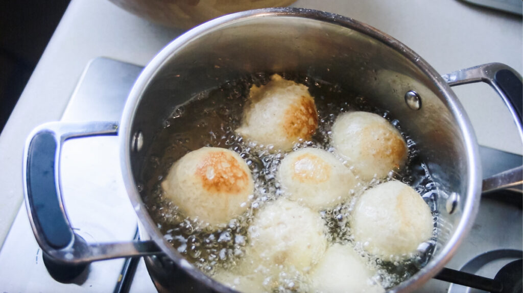 puff puff frying in lard