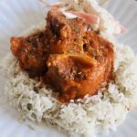 Oxtail stew and rice with coleslaw