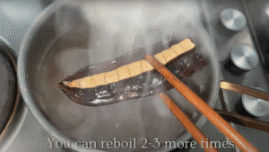 finished boiling prekese tea in saucepan