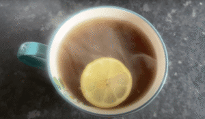prekese tea in a mug with lemon slice